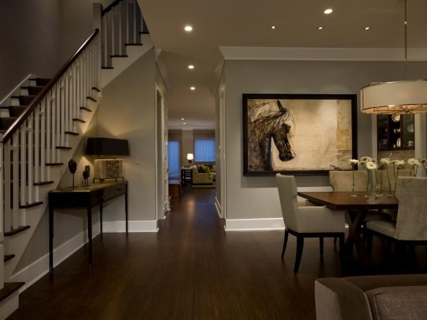 looking into the house, stairs on left, table on right