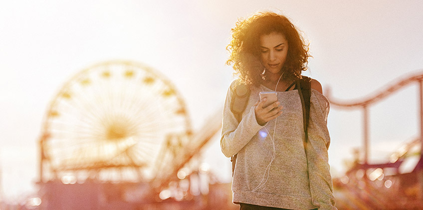 Woman on phone in the summer heat